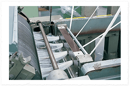 Close-up of a mechanical component with gears and metal parts.